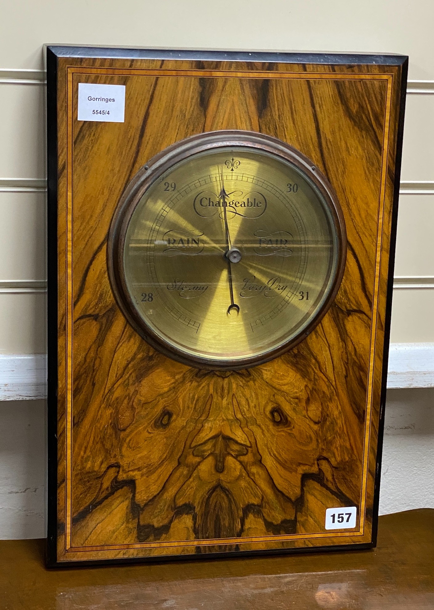 An inlaid walnut framed aneroid barometer, width 32cm, height 48cm